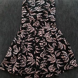 black and pink strapless cocktail dress